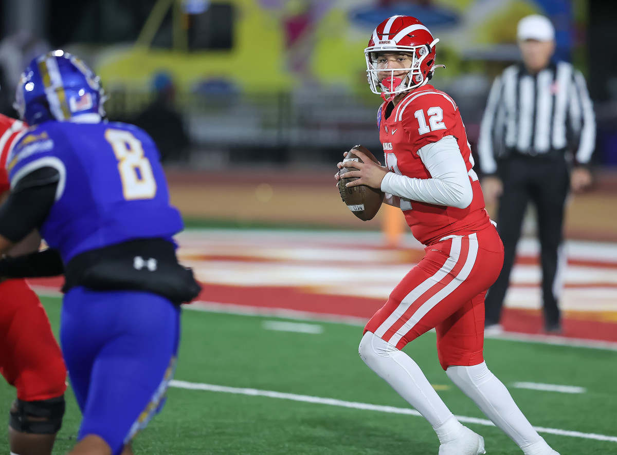 Elijah Brown completed 8 of 13 passes for 187 yards and three touchdowns in the first half for the Monarchs.